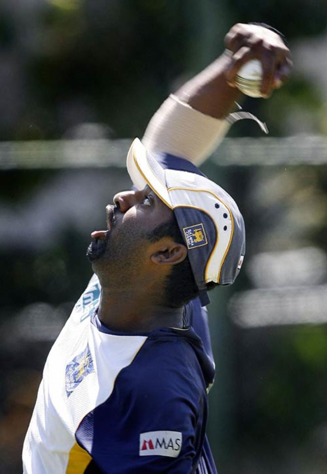 Muttiah Muralitharan lets one rip during the nets session, Colombo, October 9, 2007