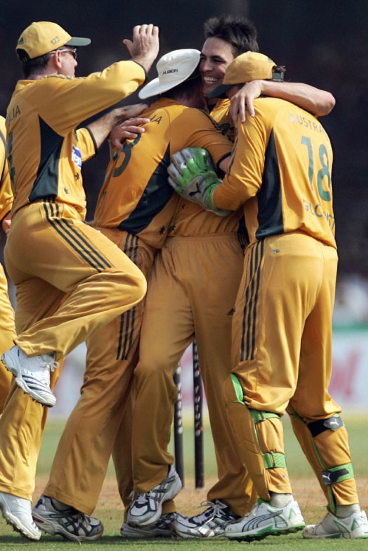 Mitchell Johnson is mobbed by his team-mates, India v Australia, 5th ODI, Vadodara, October 11, 2007 
