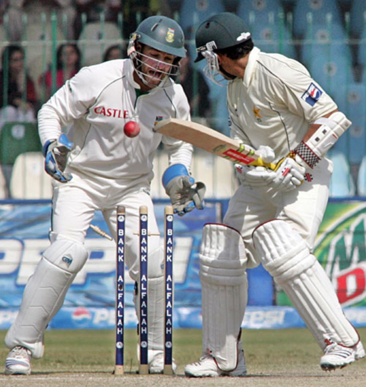 Kamran Akmal is bowled by Paul Harris, Pakistan v South Africa, 2nd Test, Lahore, 5th day, October 12, 2007