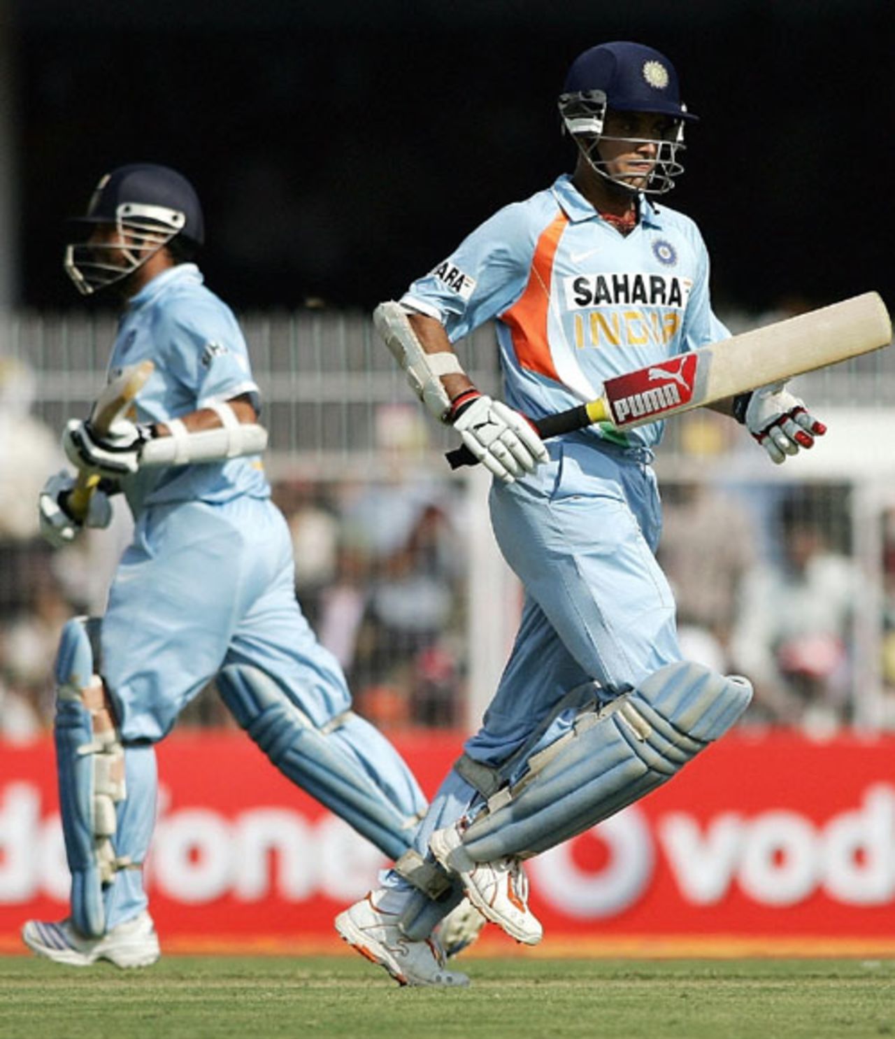 Sachin Tendulkar and Sourav Ganguly pick up a single during their century stand,  
India v Australia, 6th ODI, Nagpur, October 14, 2007   

