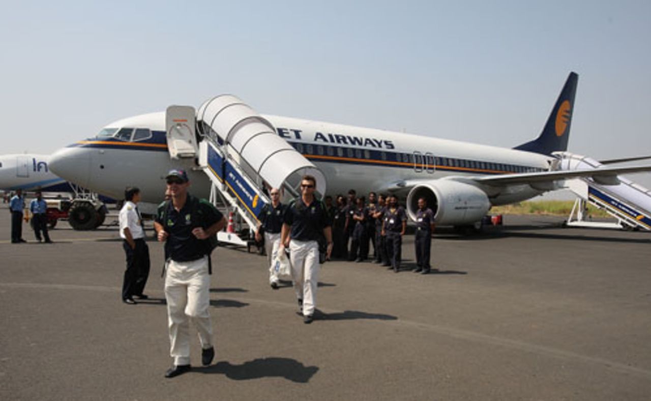 The Australian team disembark Jet Airways flight 112 after it hit a bird, Nagpur, October 15, 2007