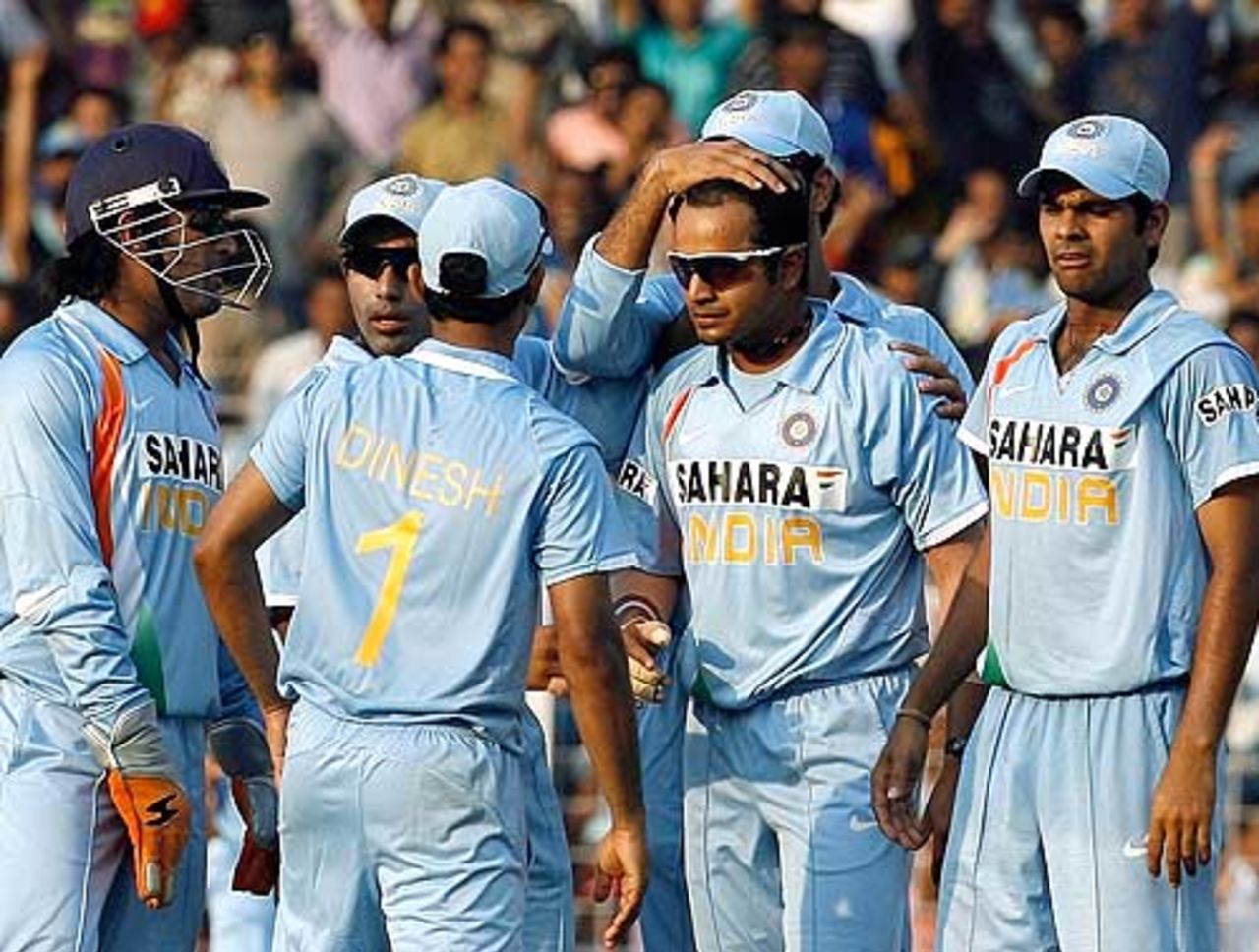 The Indian players huddle up at the fall of a wicket, India v Australia, 7th ODI, Mumbai, October 17, 2007