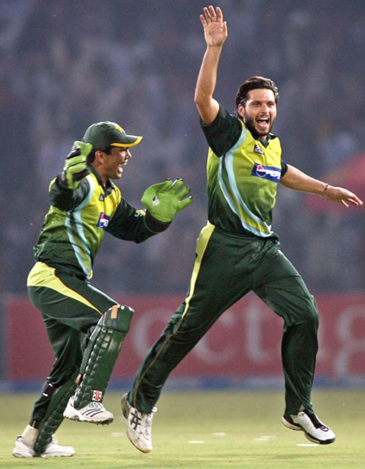 Shahid Afridi and Kamran Akmal celebrate the fall of Mark Boucher, Pakistan v South Africa, 2nd ODI, Lahore, October 20, 2007