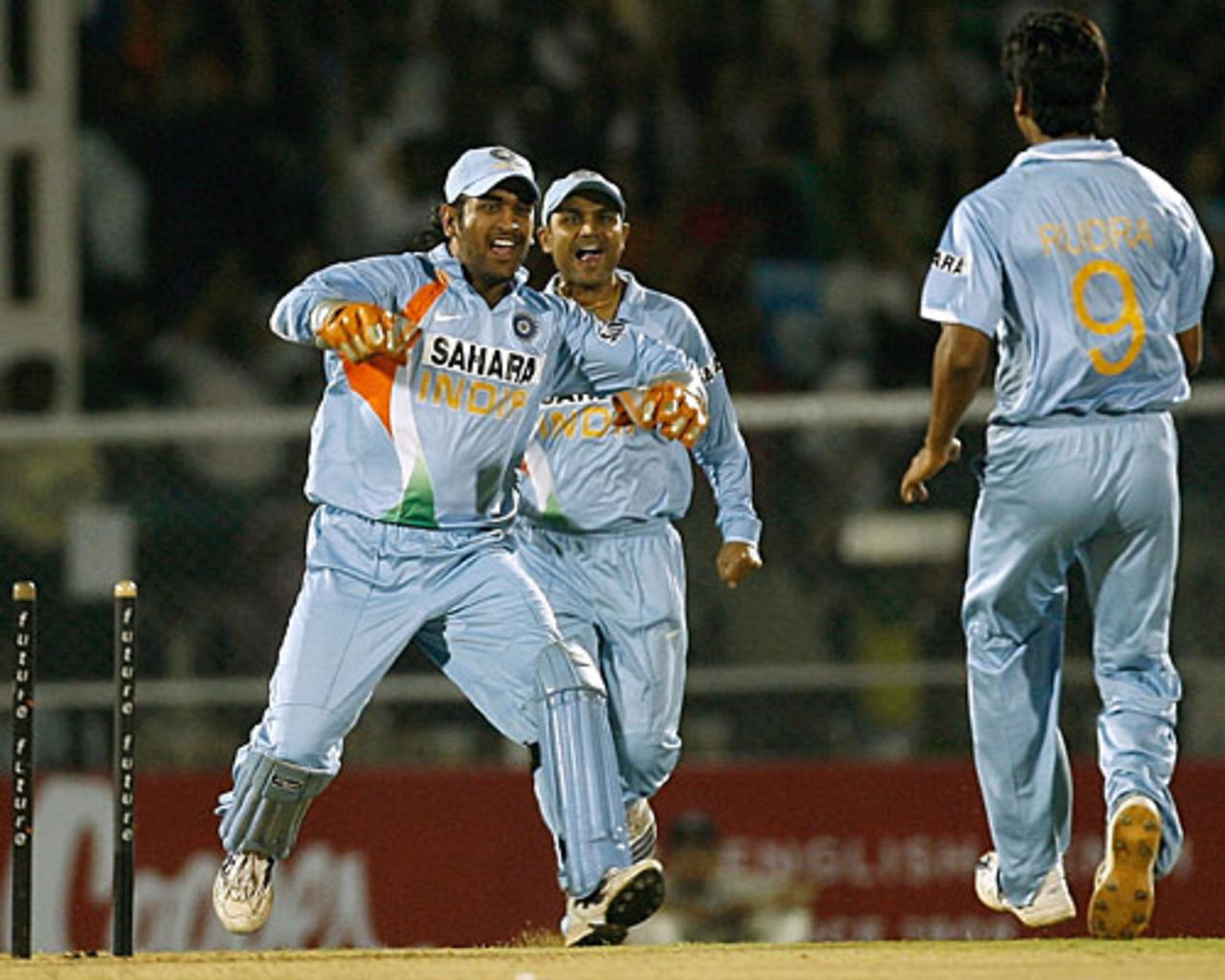 Mahendra Singh Dhoni rushes to congratulate RP Singh after Adam Gilchrist's wicket, India v Australia, Twenty20 international, Mumbai, October 20, 2007