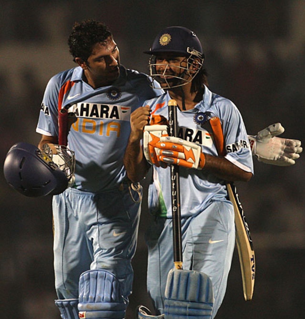 Yuvraj Singh and Mahendra Singh Dhoni walk off after the victory, India v Australia, Twenty20 international, Mumbai, October 20, 2007