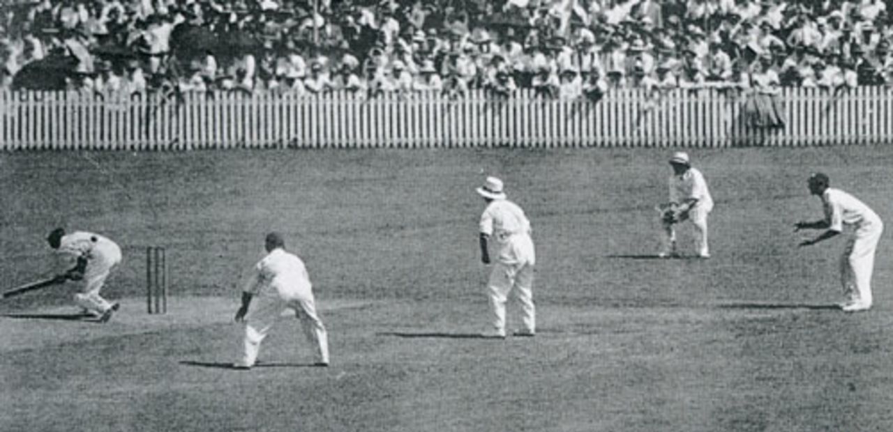 Bill Woodfull ducks a Harold Larwood bouncer and is struck in the ribs, Australia v England, 4th Test, Brisbane, February 10, 1933