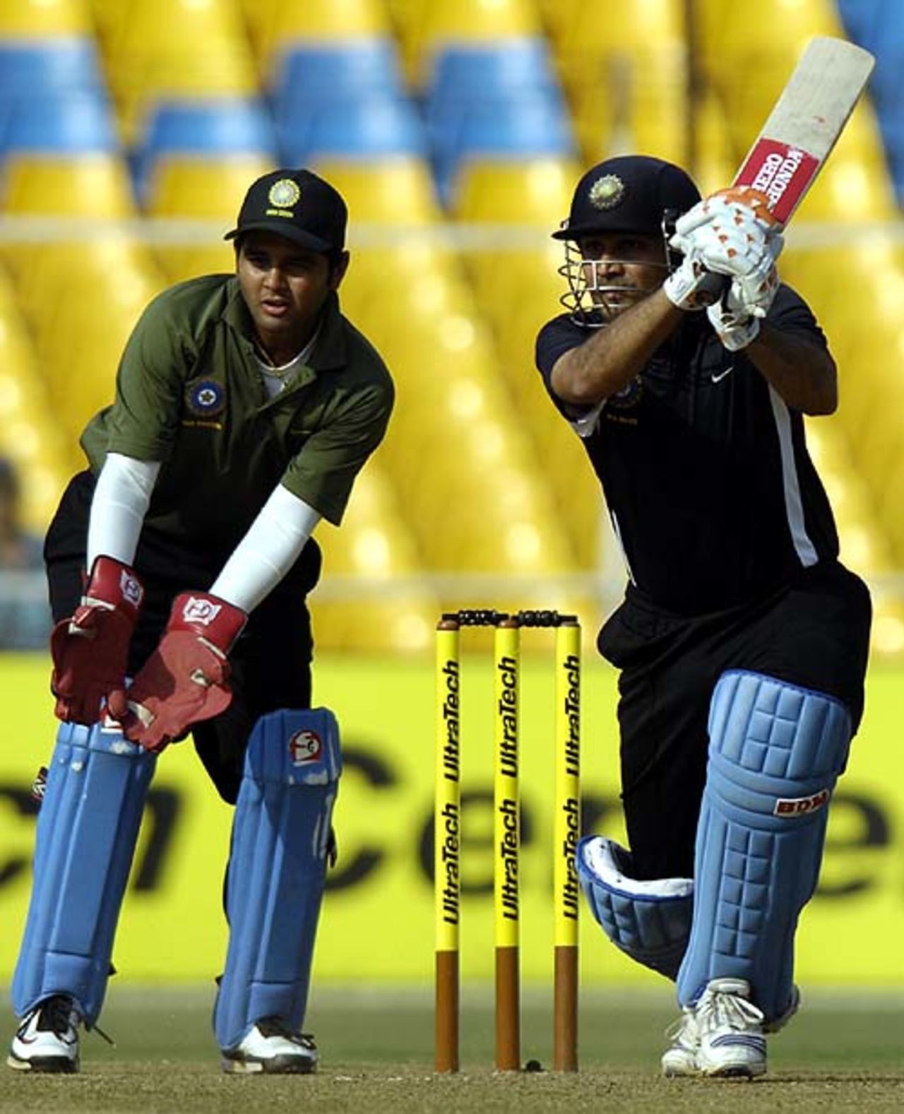 Parthiv Patel, the India Green captain, looks on as his opposition counterpart drives through the covers, India Blue v India Green, 3rd match, Challenger Trophy, Ahmedabad, October 27, 2007