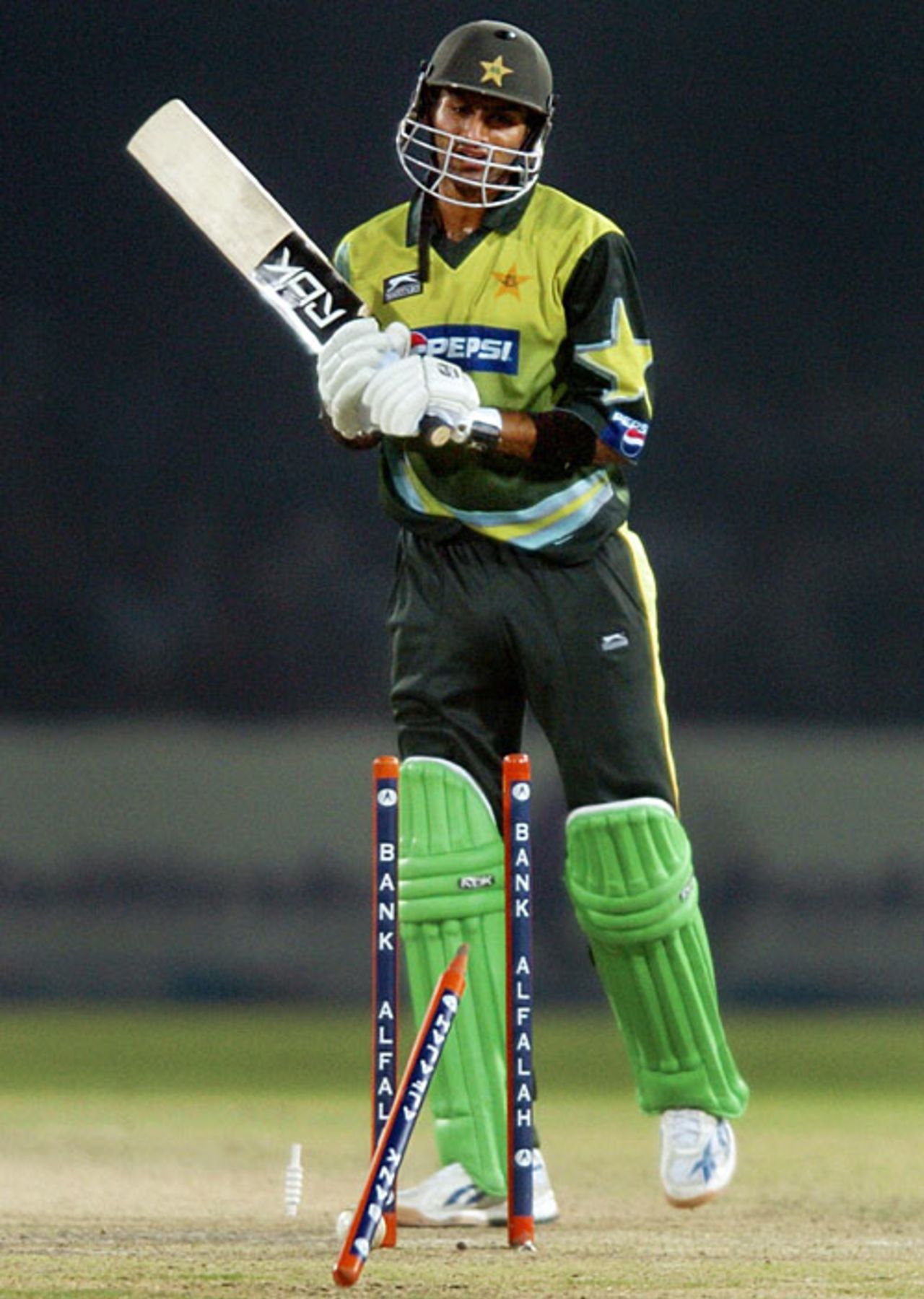 Shoaib Malik looks back at his knocked-over stumps, Pakistan v South Africa, 5th ODI, Lahore, October 29, 2007