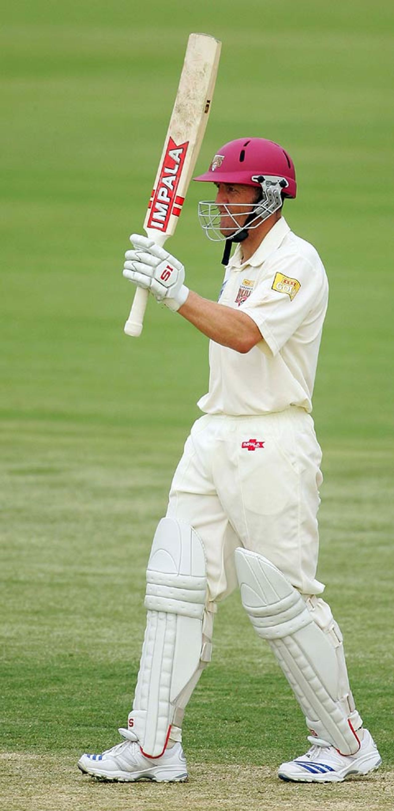 Clinton Perren celebrates his half-century as he guides the Bulls to victory, Queensland v Sri Lankans, 3rd day, Brisbane, November 4, 2007