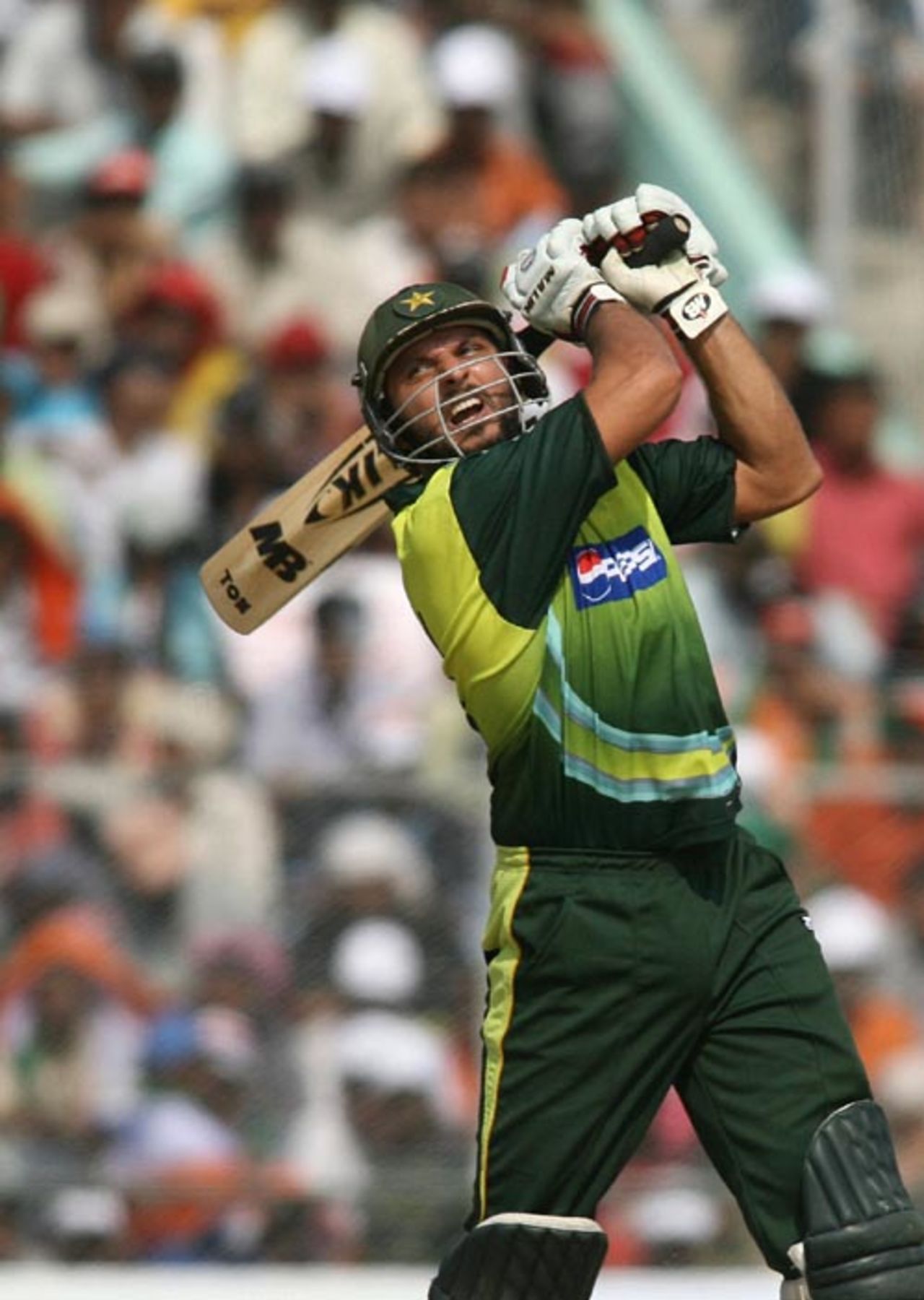 Shahid Afridi powers the ball over the covers, India v Pakistan, 1st ODI, Guwahati, November 5, 2007