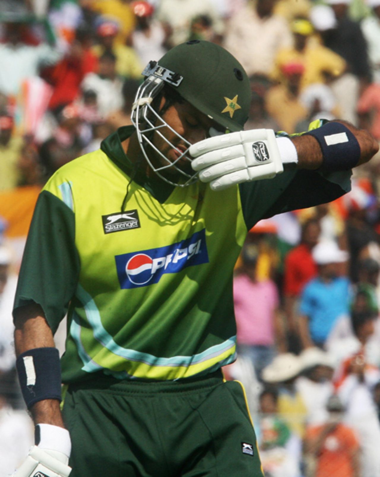 Shoaib Malik is downcast after sending a full toss straight into the hands of the fielder at deep midwicket, India v Pakistan, 1st ODI, Guwahati, November 5, 2007 