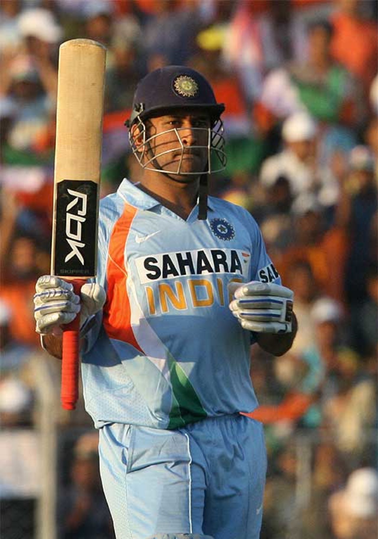 MS Dhoni acknowledges the applause after reaching his half-century, India v Pakistan, 1st ODI, Guwahati, November 5, 2007