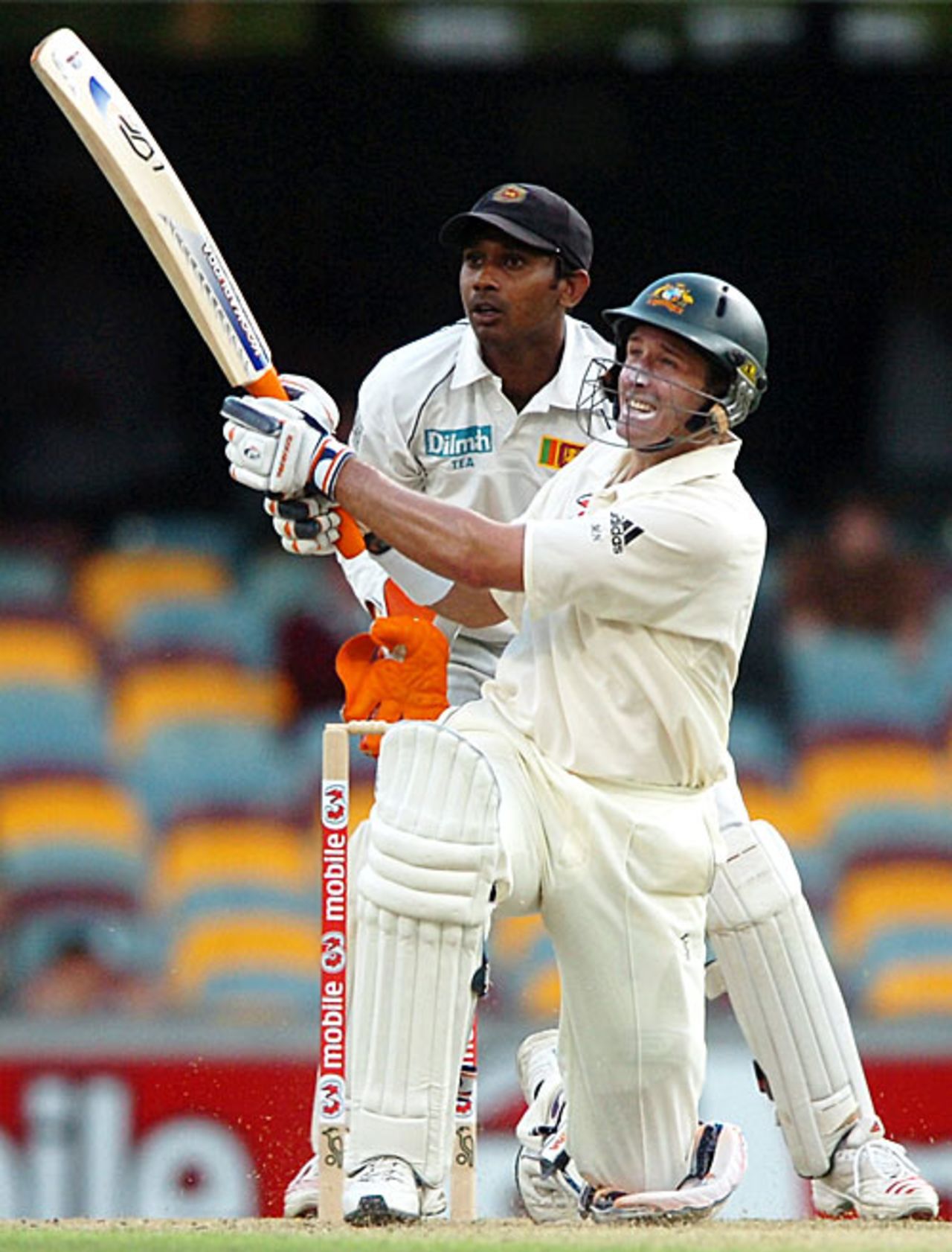 Mike Hussey slog-sweeps over midwicket, Australia v Sri Lanka, 1st Test, Brisbane, 1st day, November 8, 2007