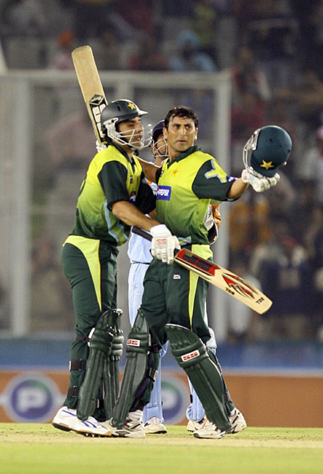 Younis Khan raises the bat after reaching his century, India v Pakistan, 2nd ODI, Mohali, November 8, 2007