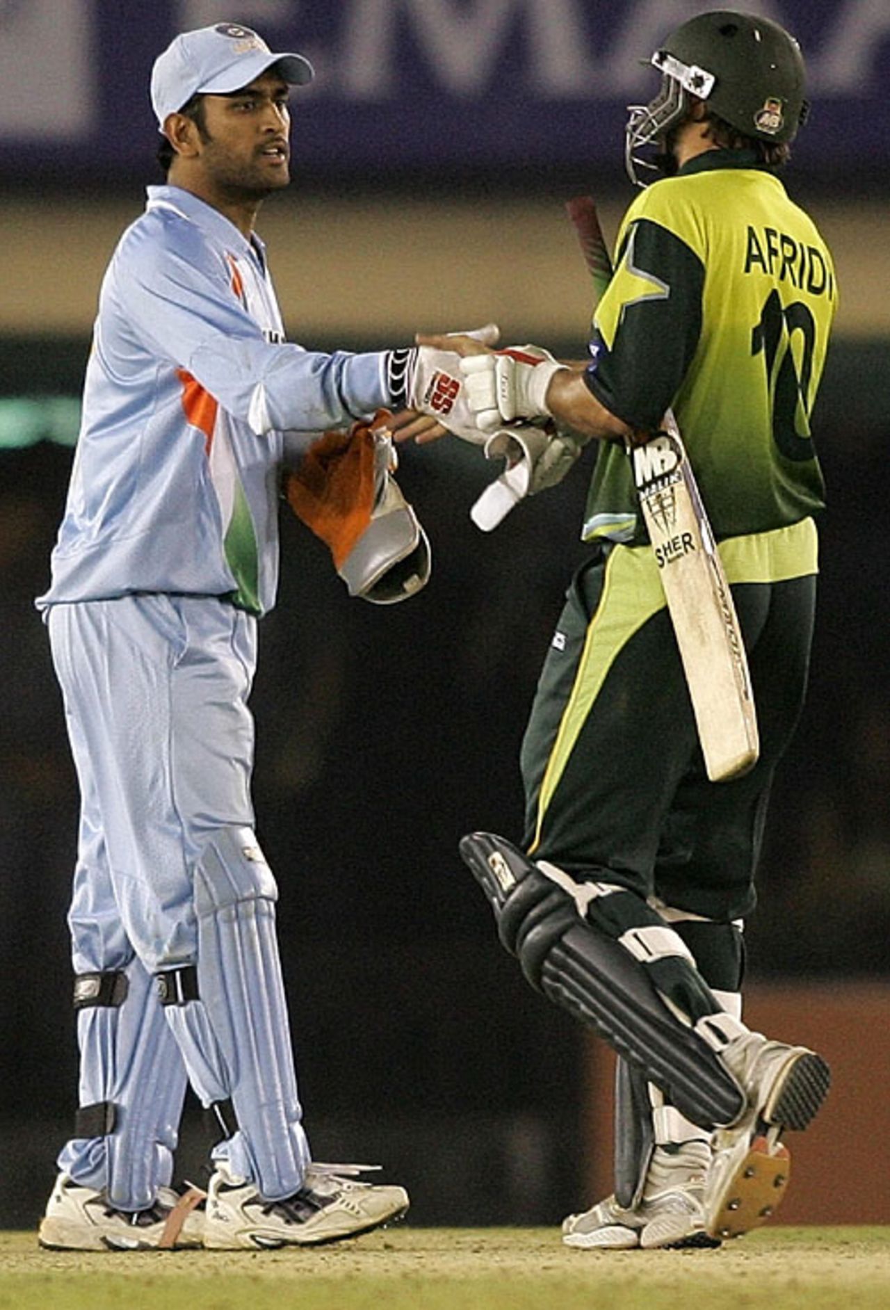 Mahendra Singh Dhoni congratulates Shahid Afridi after Pakistan won by four wickets, India v Pakistan, 2nd ODI, Mohali, November 8, 2007