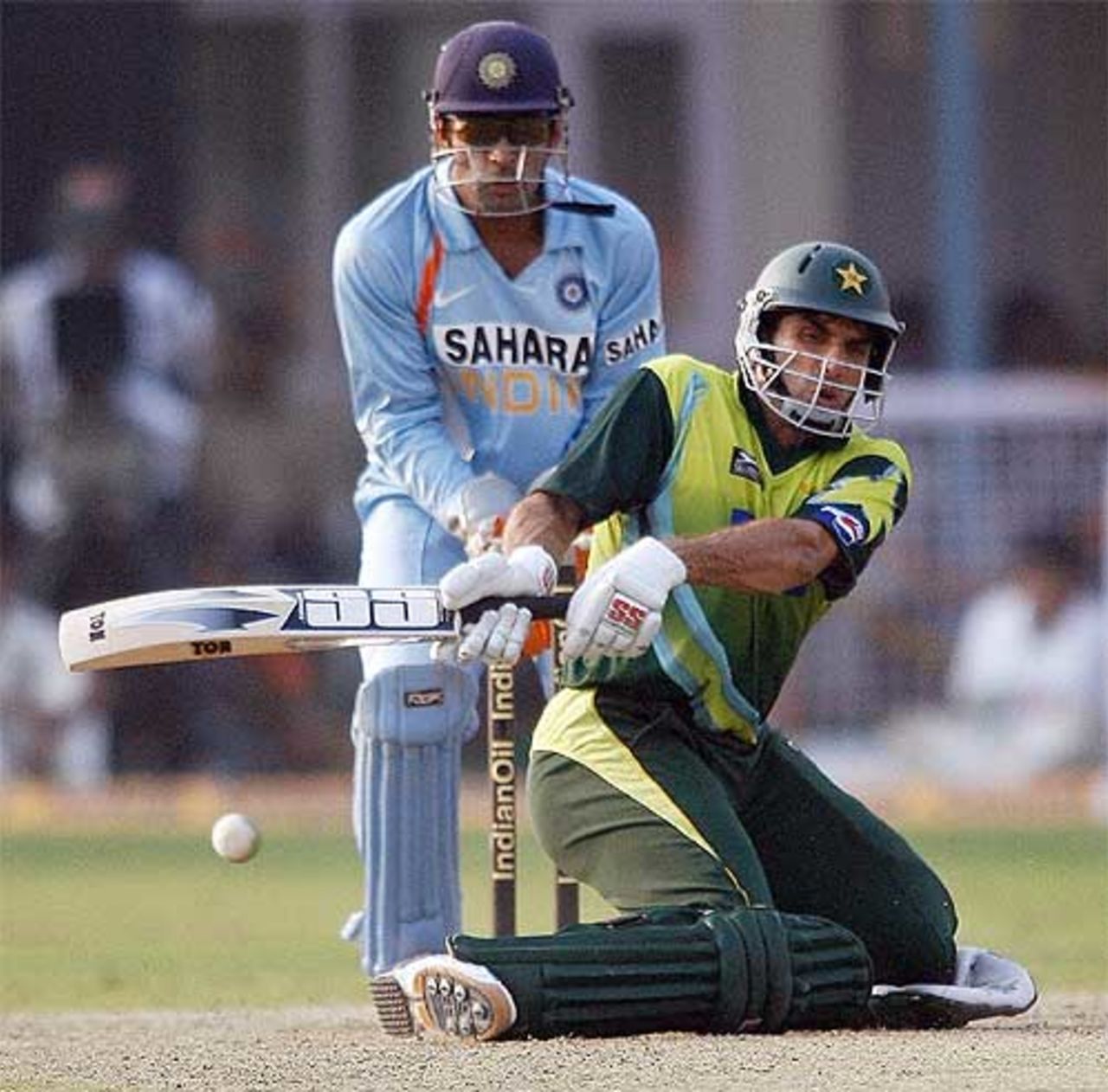 Misbah-ul-Haq in some discomfort while playing a reverse-sweep, India v Pakistan, 3rd ODI, Kanpur, November 11, 2007