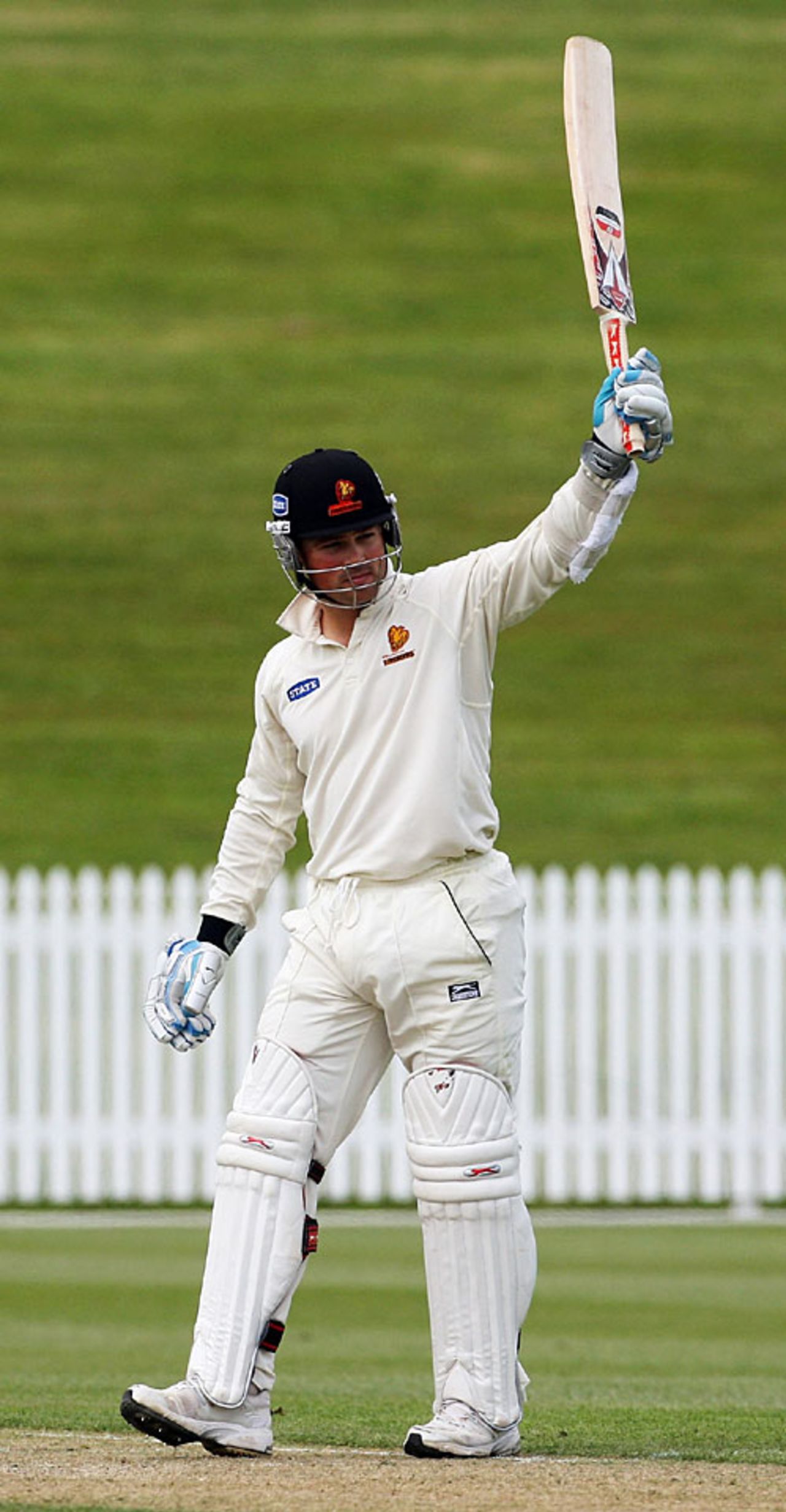 Matthew Bell raises the bat after reaching his half-century for Wellington, Northern Districts v Wellington, State Championship, 2nd day, Hamilton, November 13, 2007