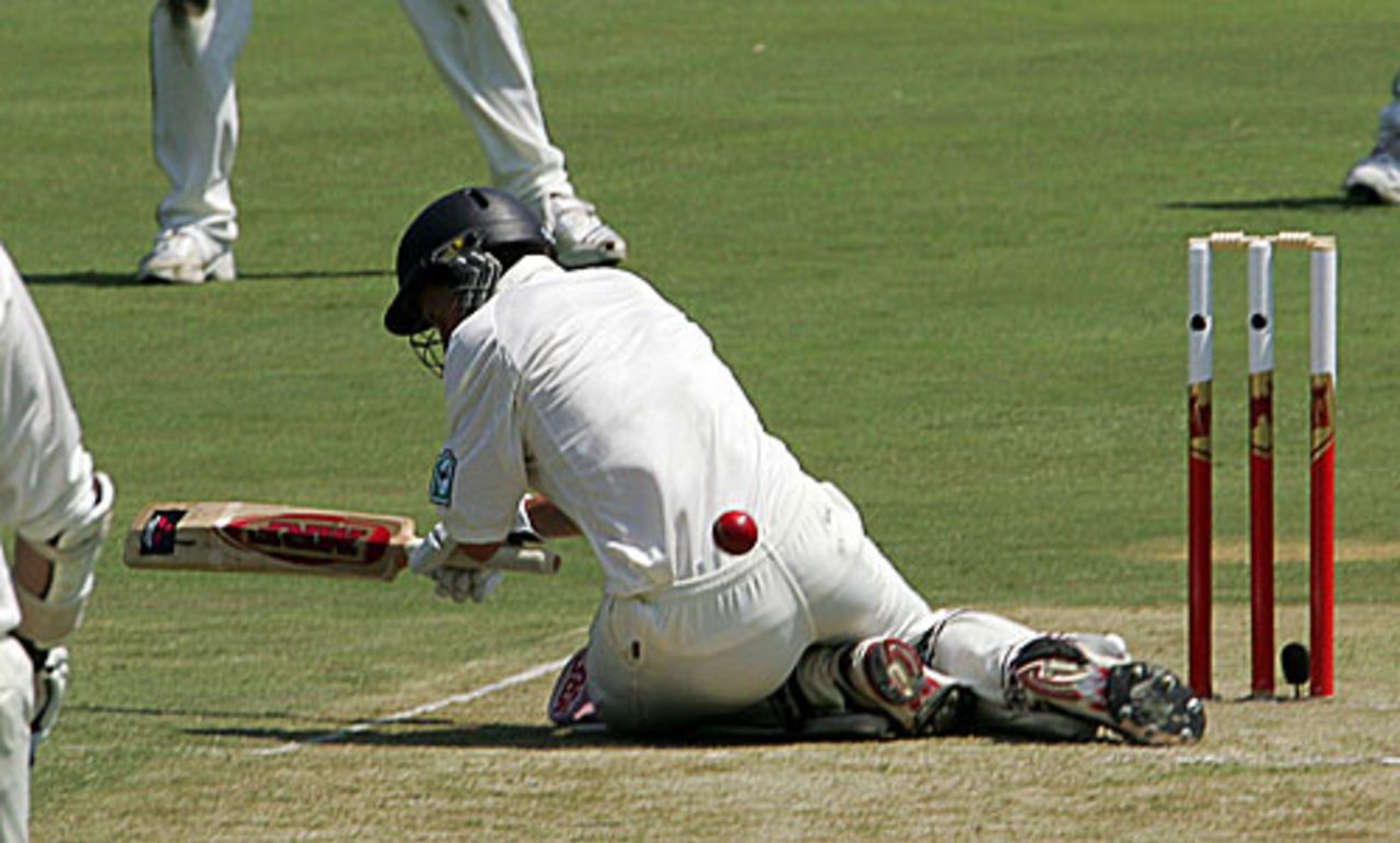 Craig Cumming is floored after being hit on the grill by Dale Steyn, South Africa v New Zealand, 2nd Test, Centurion, 1st day, November 16, 2007