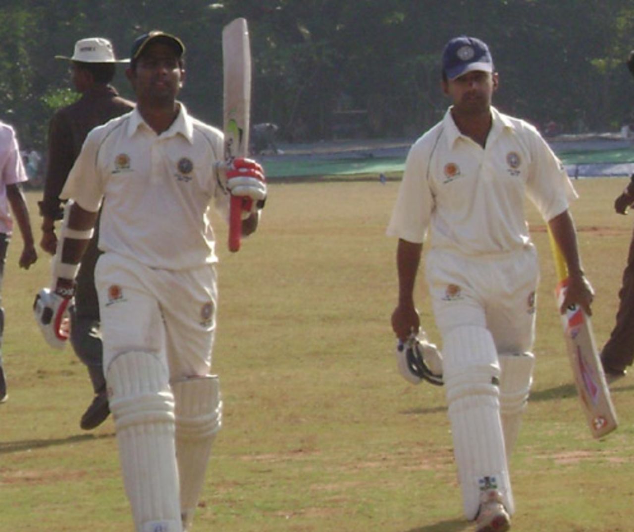 Sreekumar Nair and Vinan Nair walk off the field after Kerala declared their first innings on 566 for 6, Kerala v Services, Ranji Trophy Plate League, Group A, 2nd round, 2nd day, Palakkad, November 16, 2007