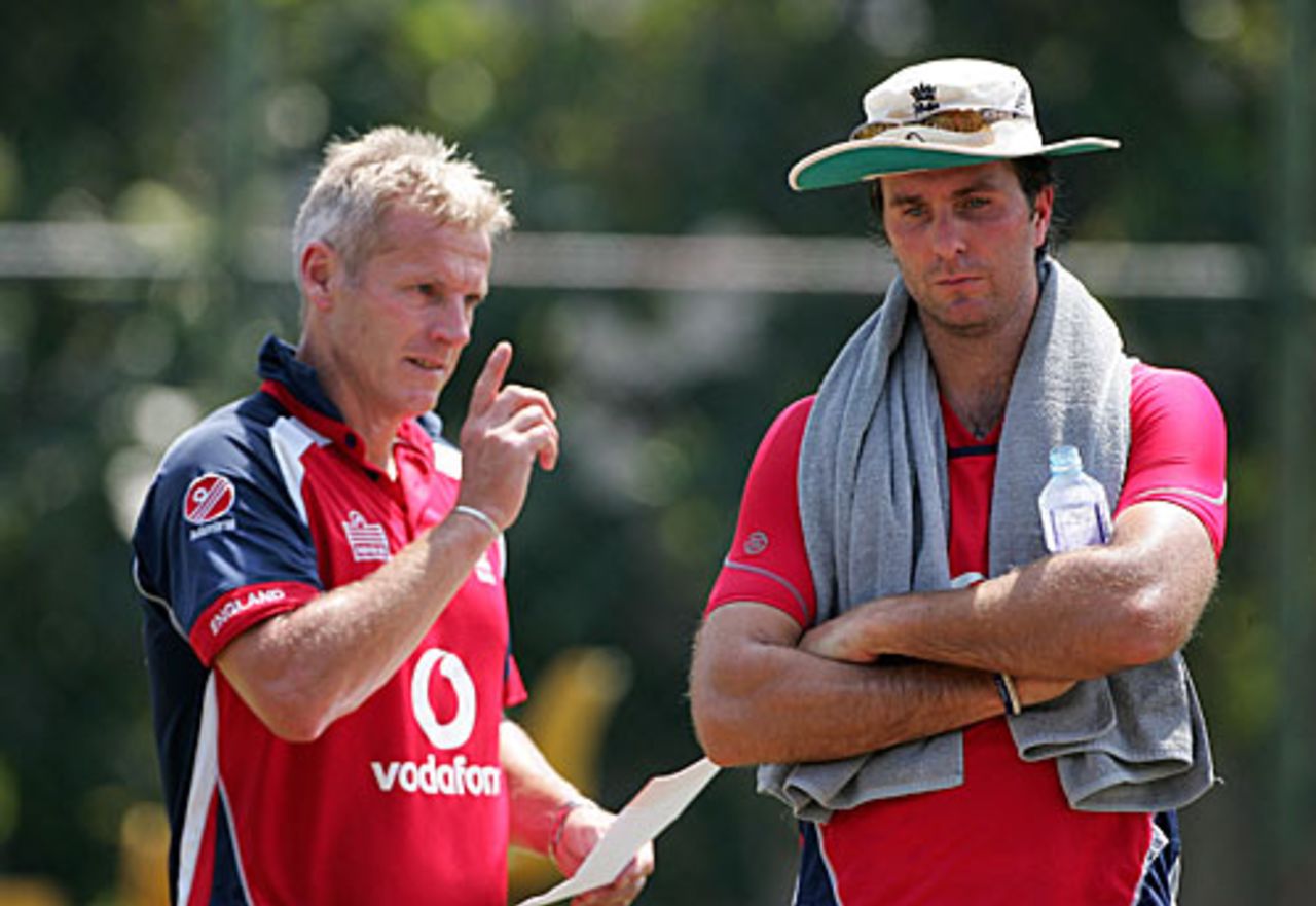 Peter Moores makes a point to Michael Vaughan during a net session in Sri Lanka, Colombo, November 18, 2007
