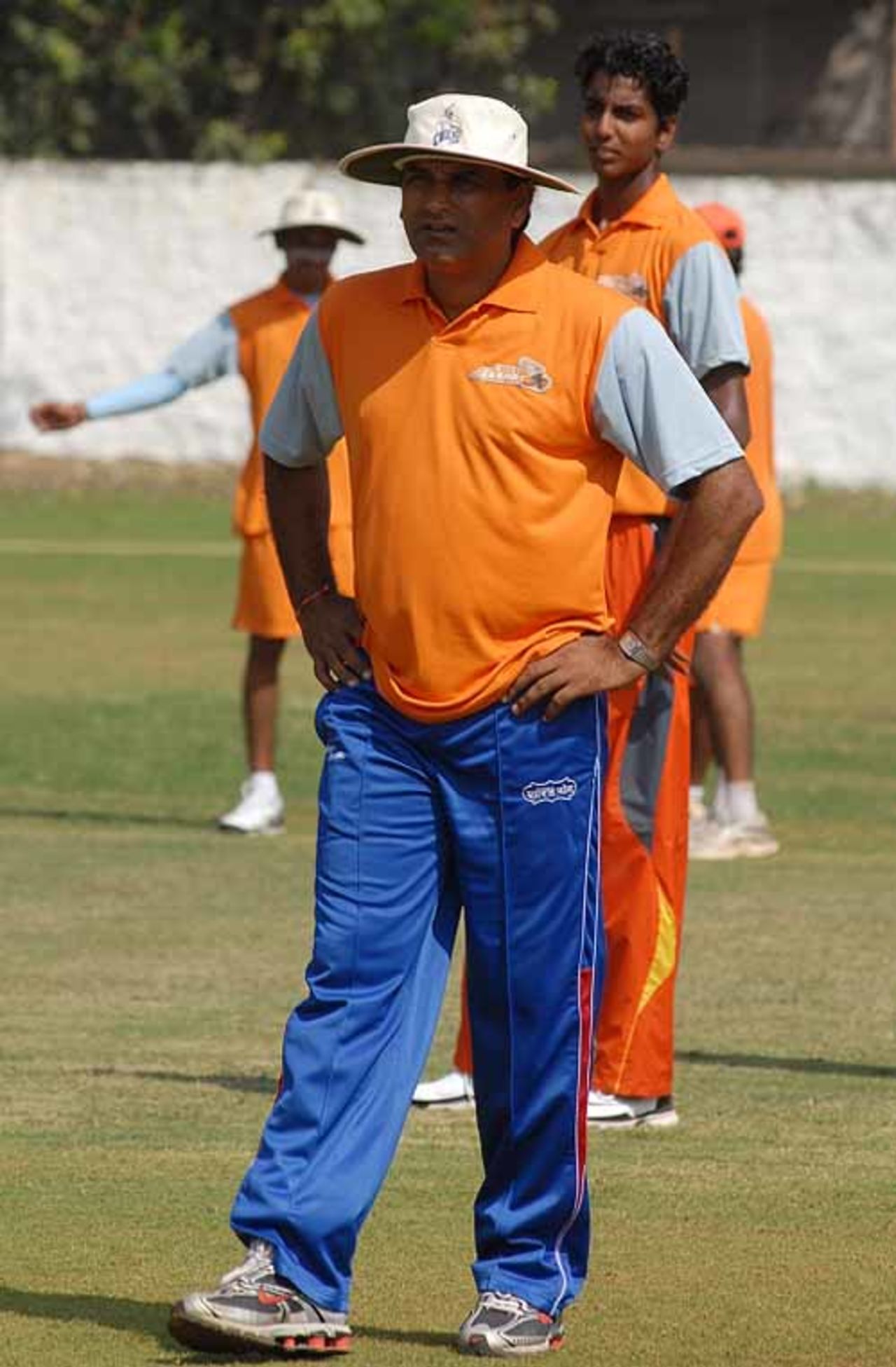 Rajesh Chauhan, the former India offspinner, oversees a practice session of the Mumbai Champs, Mumbai, November 19, 2007
