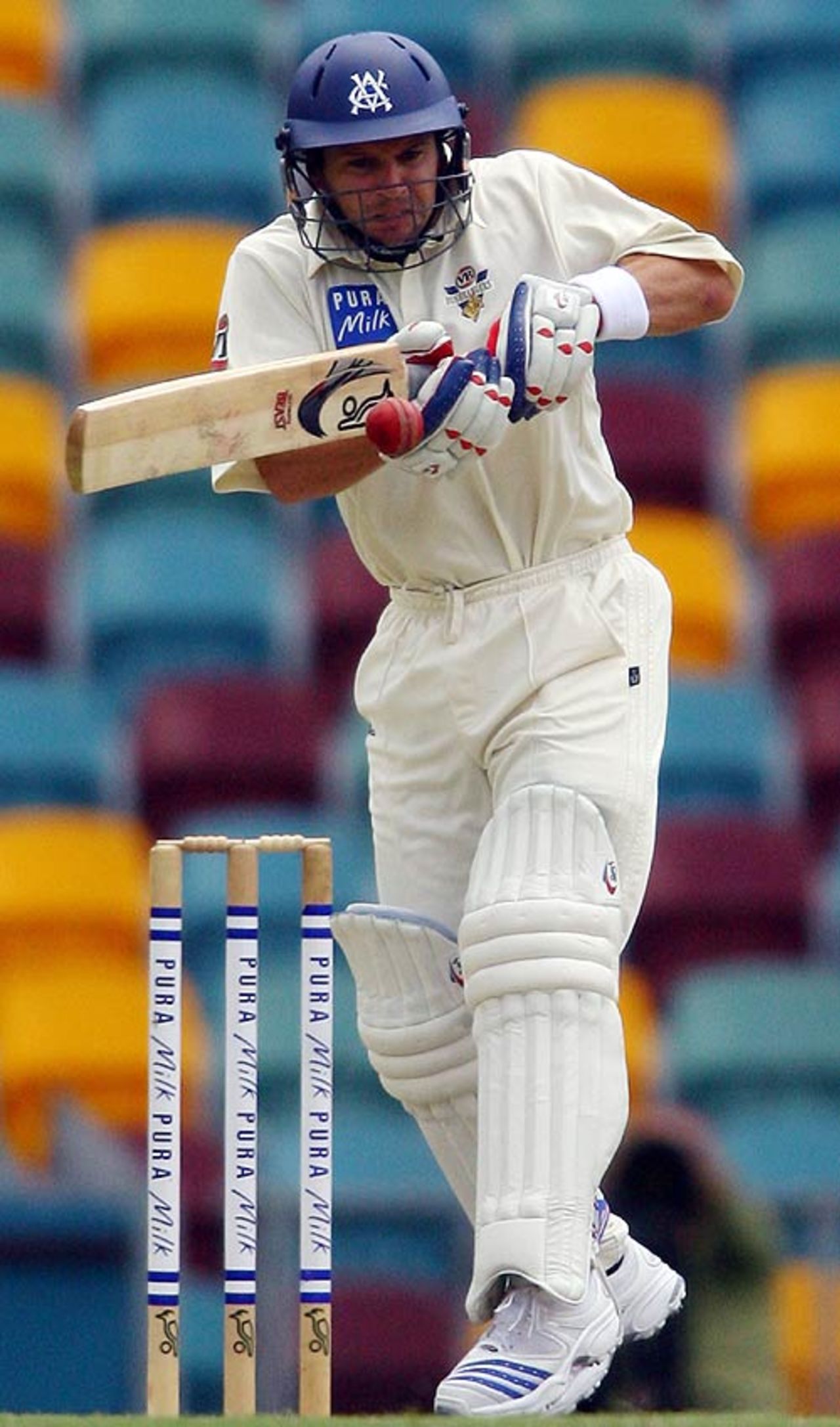Brad Hodge watches the ball closely on his way to a century, Queensland v Victoria, Pura Cup, Brisbane, November 20, 2007