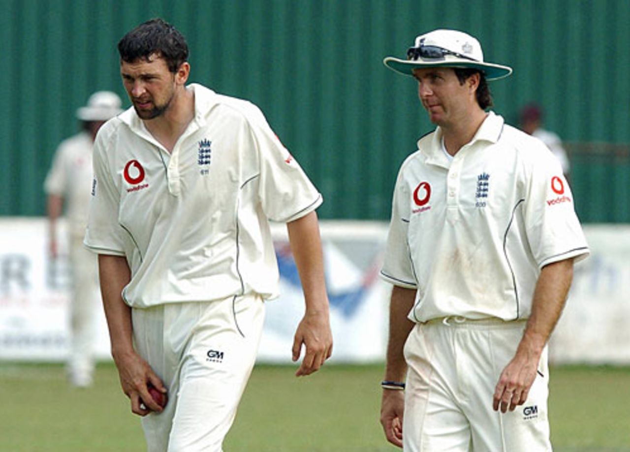 A word in your ear: Michael Vaughan discusses plans with Steve Harmison, Sri Lanka Cricket Board President's XI v England XI, Colombo, November 21, 2007