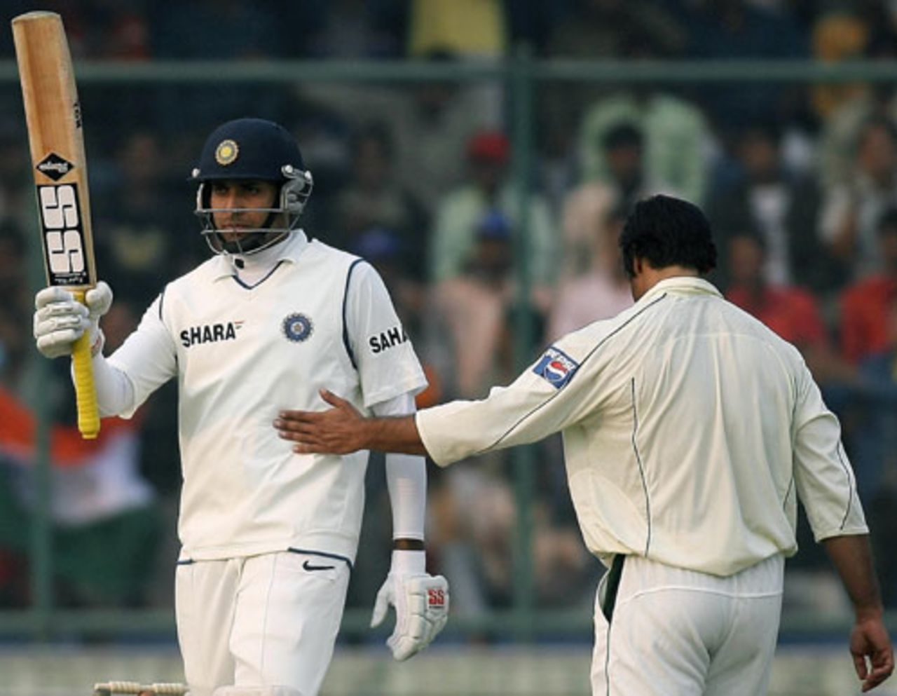Shoaib Akhtar congratulates VVS Laxman on his fifty, India v Pakistan, 1st Test, Delhi, 2nd day, November 23, 2007