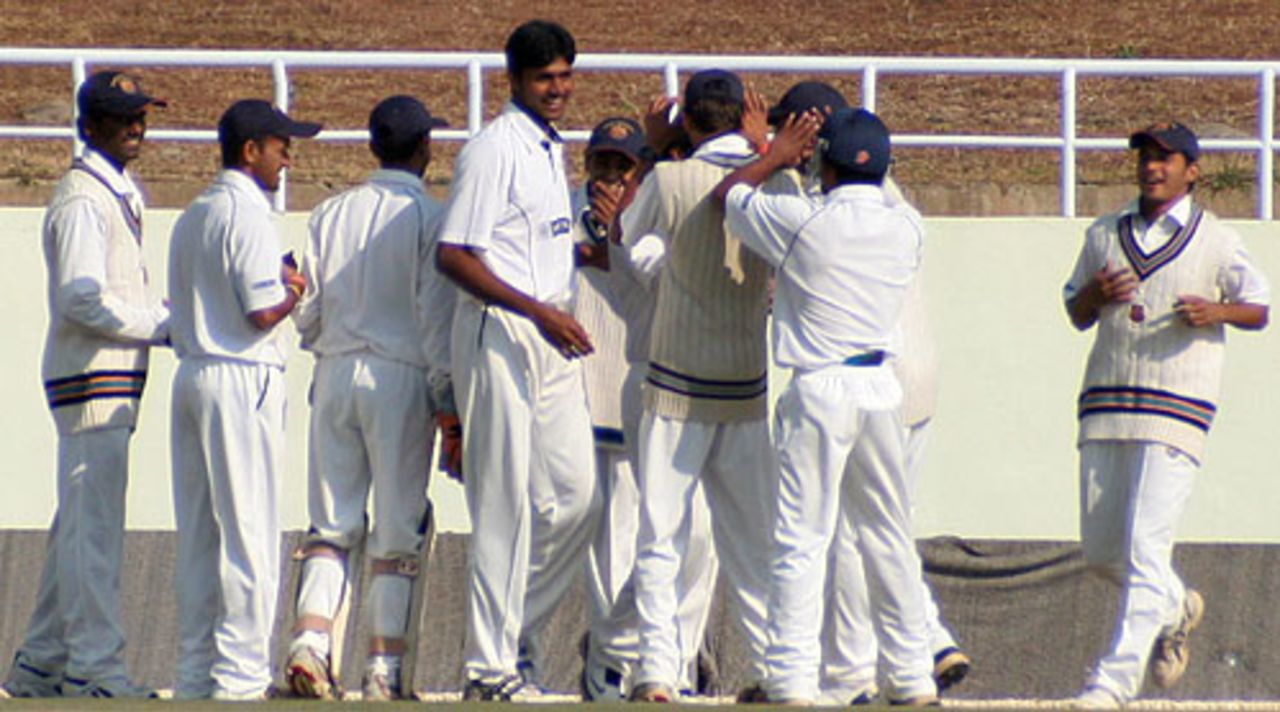 The Maharashtra players celebrate the wicket of Himachal Pradesh's Barun Sharma, Himachal Pradesh v Maharashtra, Ranji Trophy Super League, Group A, 3rd round, Dharamsala, 2nd day, November 24, 2007 

