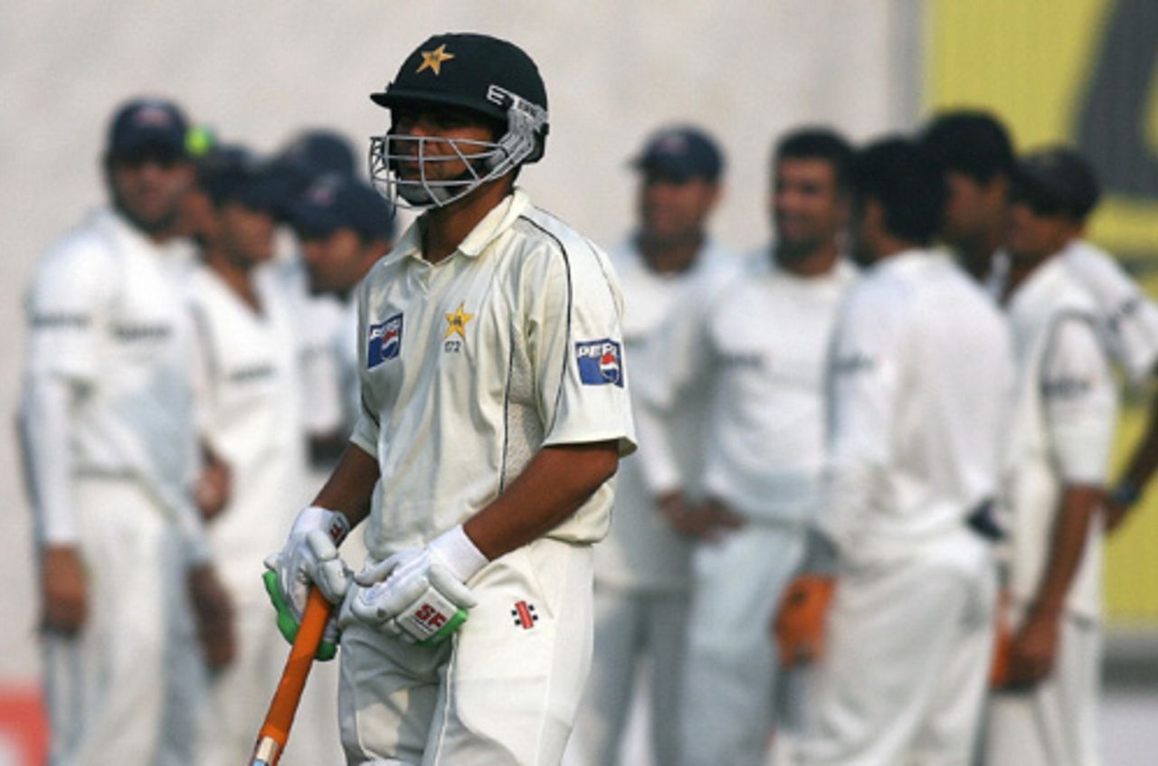 Kamran Akmal walks back to the pavilion after falling for 21, India v Pakistan, 1st Test, Delhi, 4th day, November 25, 2007