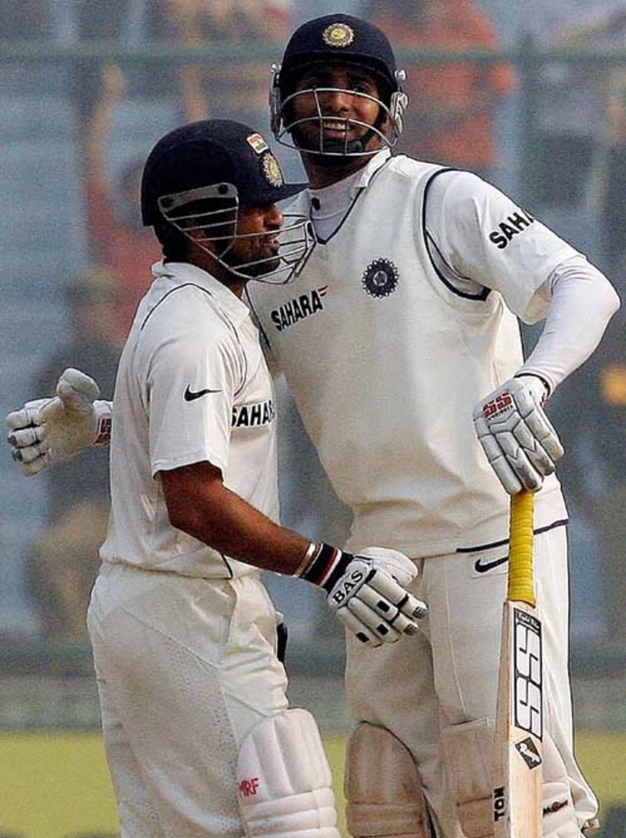 Sachin Tendulkar is congratulated by VVS Laxman after reaching his half-century, India v Pakistan, 1st Test, Delhi, 5th day, November 26, 2007