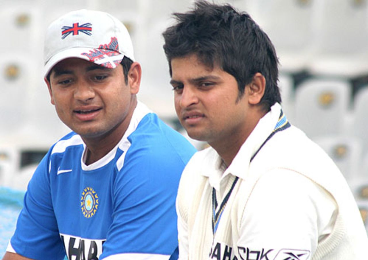 Suresh Raina and Piyush Chawla have a chat on the sidelines, Punjab v Uttar Pradesh, Ranji Trophy Super League, Group B, 3rd round, 4th day, Mohali, November 26, 2007