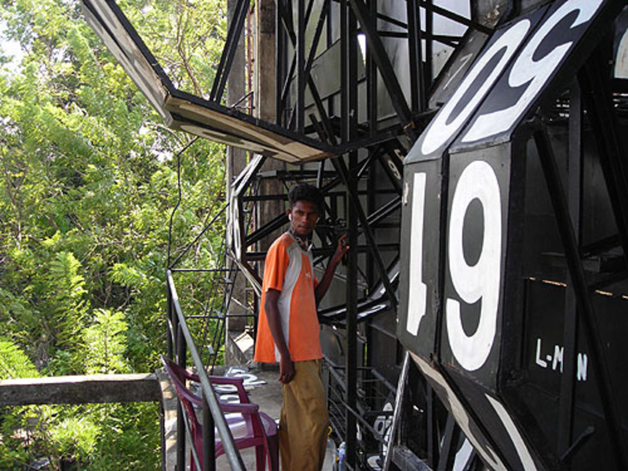 The scoreboard operator keeps busy at Colombo's Nondescripts Cricket Club, SL Board President's XI v England XI, Colombo, November 27, 2007