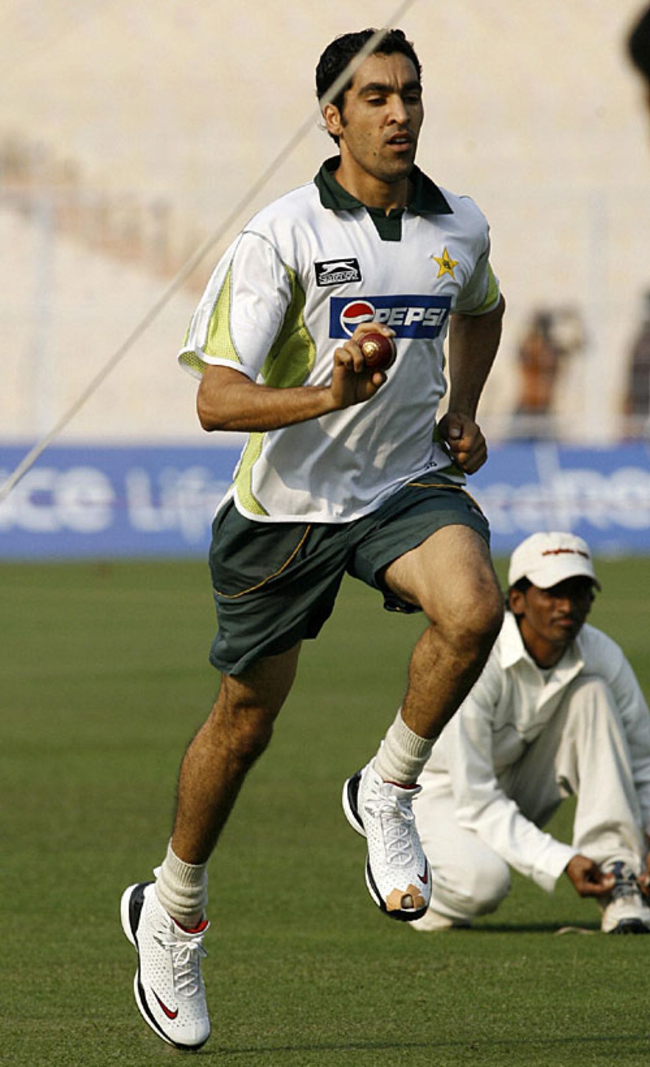 Umar Gul bowls at a net session, Kolkata, November 28, 2007