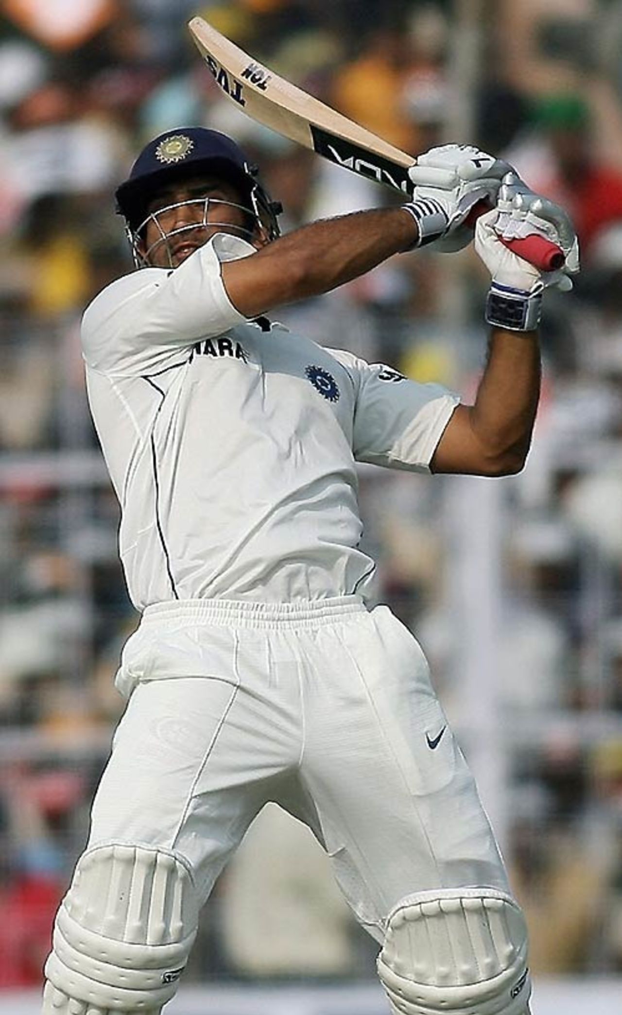Mahendra Singh Dhoni lofts over extra cover during his unbeaten 50, India v Pakistan, 2nd Test, Kolkata, 2nd day, December 1, 2007