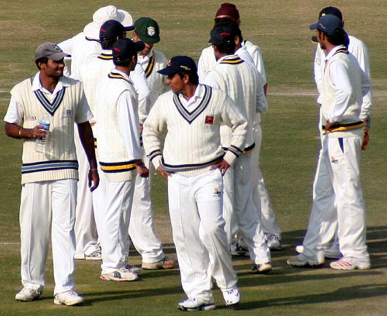 The Himachal Pradesh players take a break after getting rid of Virender Sehwag, Himachal Pradesh v Delhi, Ranji Trophy Super League, Group A, 4th round, 2nd day, Dharamsala, December 2, 2007