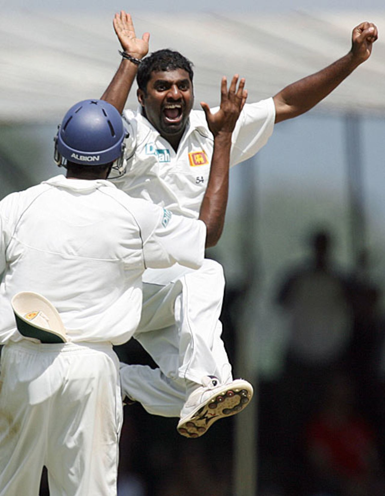 Muttiah Muralitharan jumps to celebrate his 709th Test wicket to become the world-record holder, Sri Lanka v England, 1st Test, Kandy, December 3, 2007