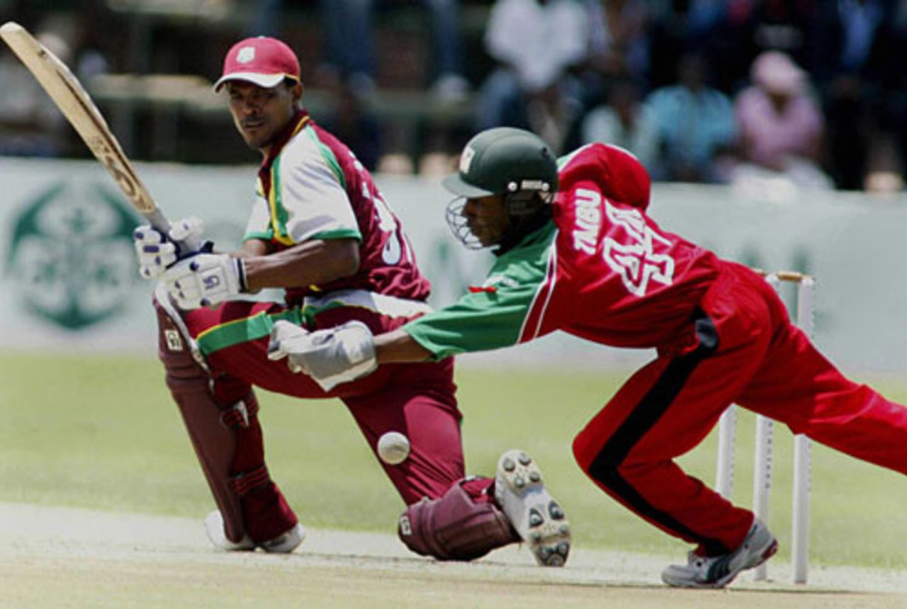 Runako Morton sweeps past Tatenda Taibu on his way to 79, ZImbabwe v West Indies, 2nd ODI, Harare, December 2, 2007
