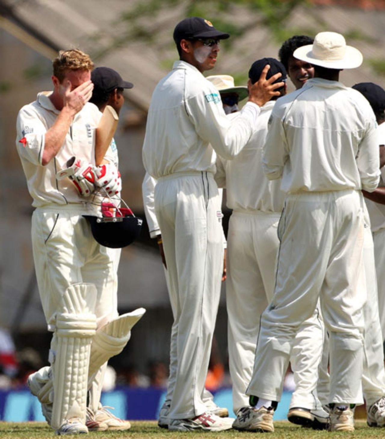 A dejected Paul Collingwood walks past the celebrating Sri Lankans, bowling Michael Vaughan, Sri Lanka v England, 1st Test, Kandy, December 5, 2007
