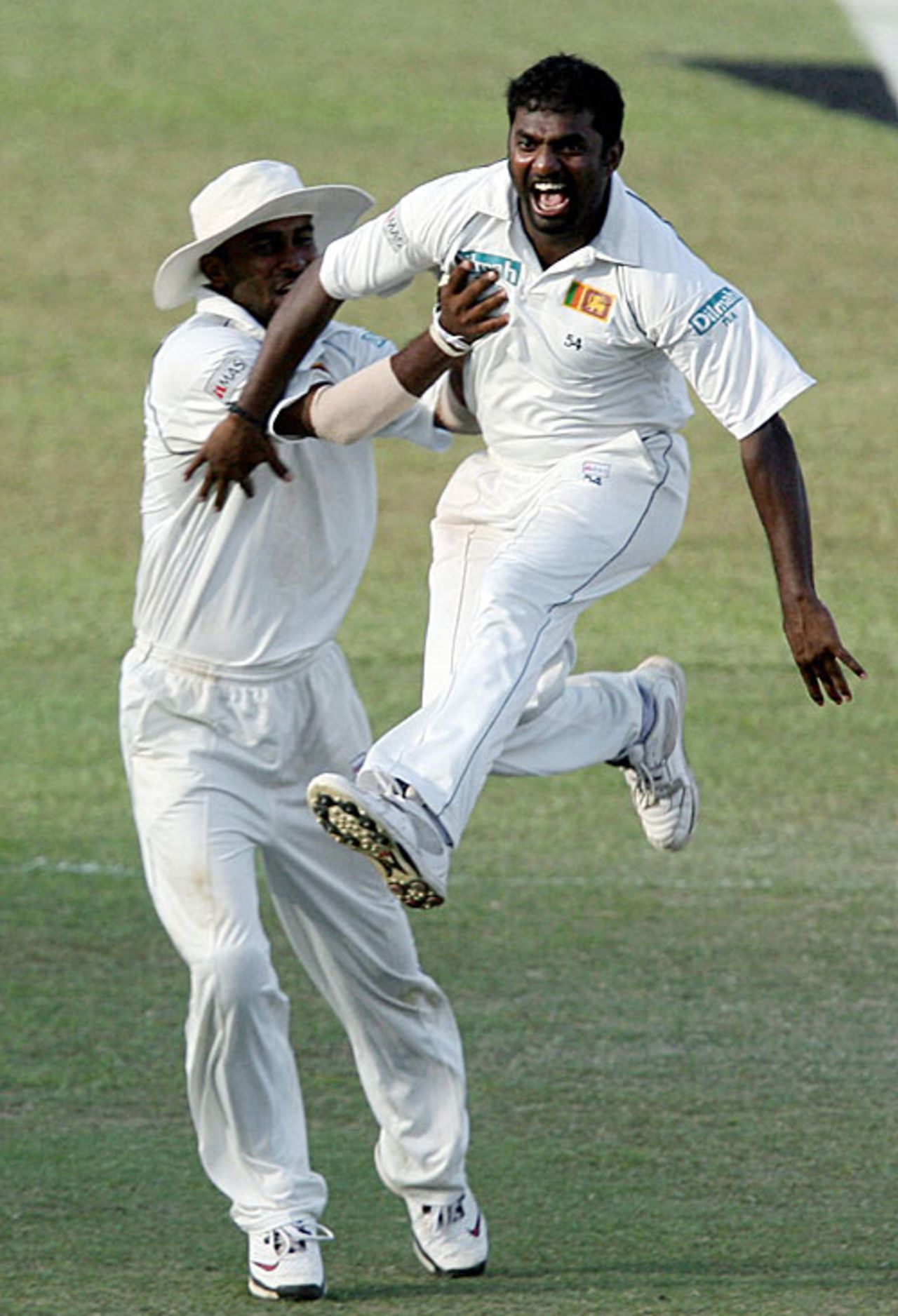 Muttiah Muralitharan is congratulated on the big wicket of Ian Bell, Sri Lanka v England, 1st Test, Kandy, December 5, 2007