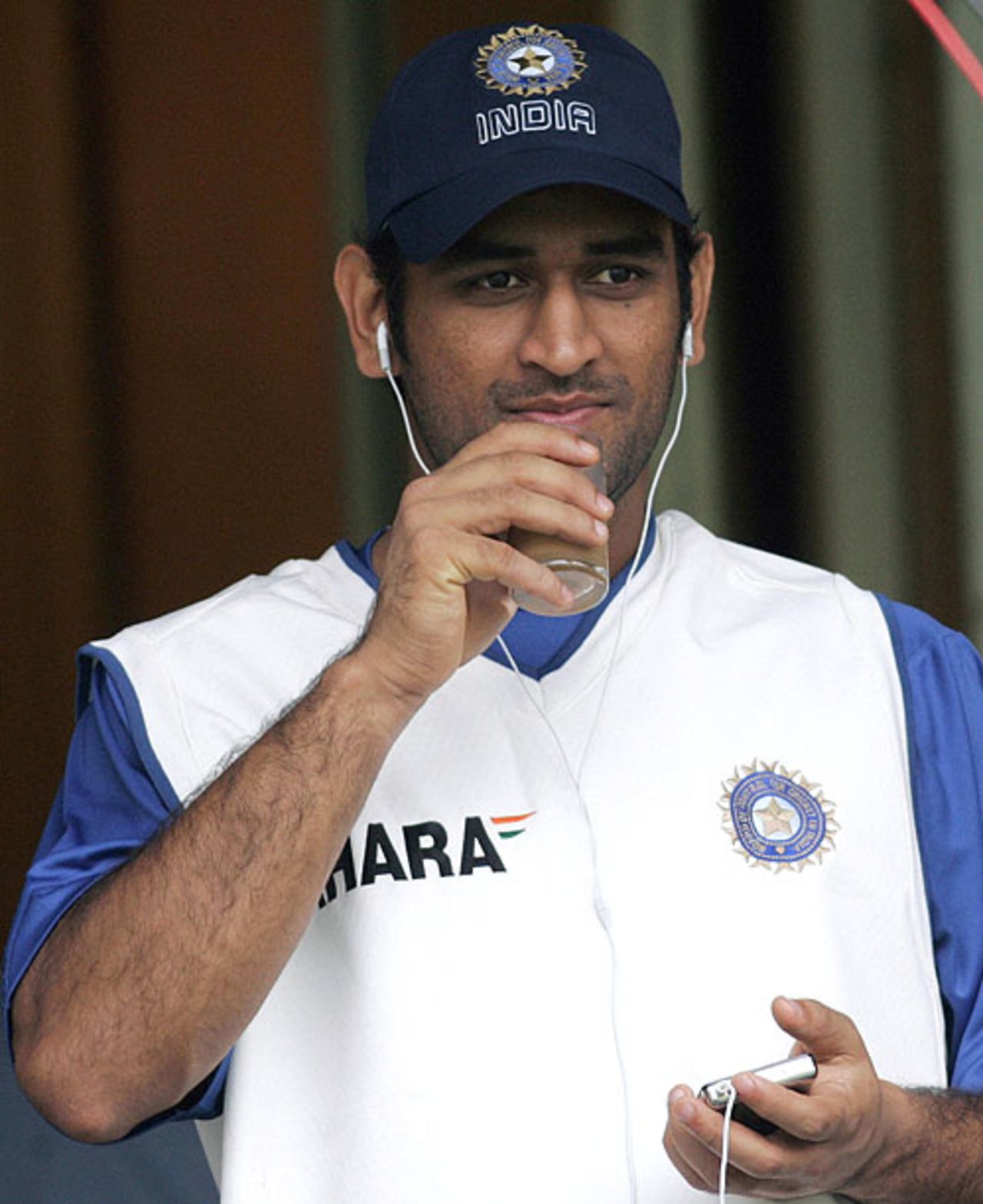 Mahendra Singh Dhoni takes time out during practice, Bangalore, December 7, 2007