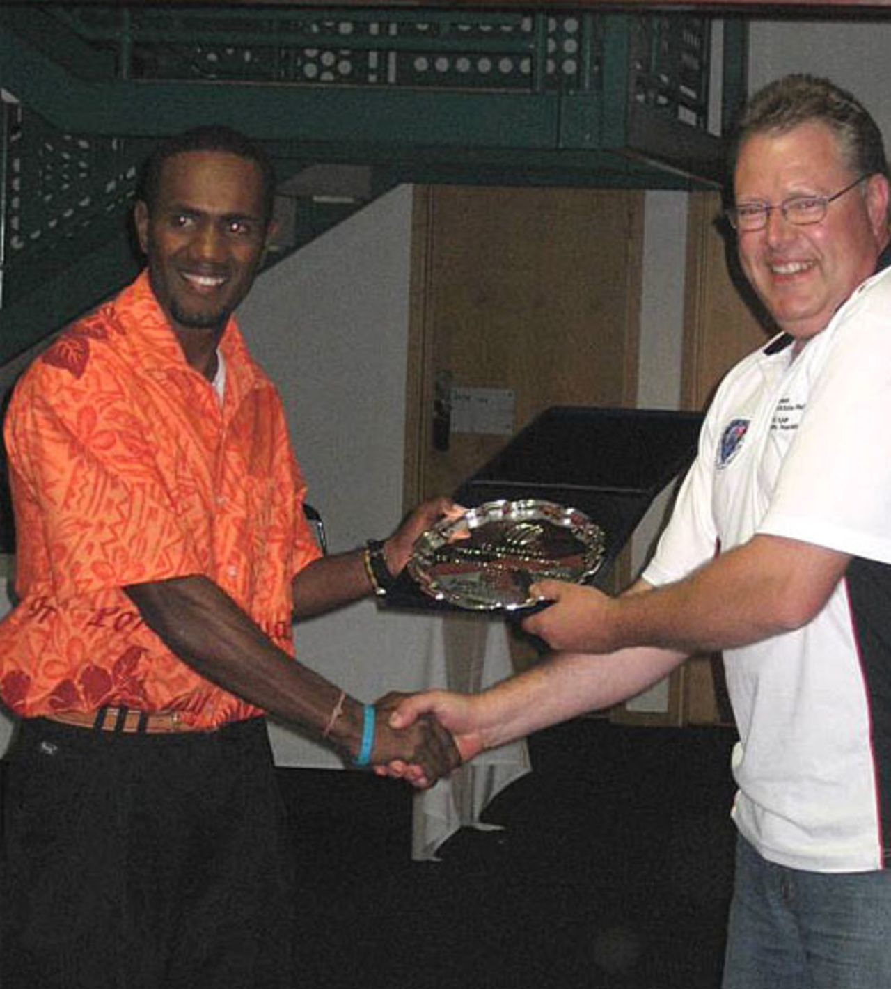 Andrew Mansale receives his Player of the Tournament trophy for his allround efforts in the EAP Trophy which helped Vanuatu qualify for the WCL Division 5
