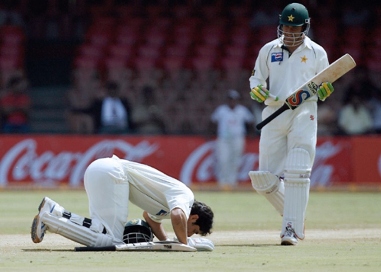 Misbah-ul-Haq celebrates his century while debutant Yasir Arafat looks on, India v Pakistan, 3rd Test, Bangalore, 4th day, December 11, 2007