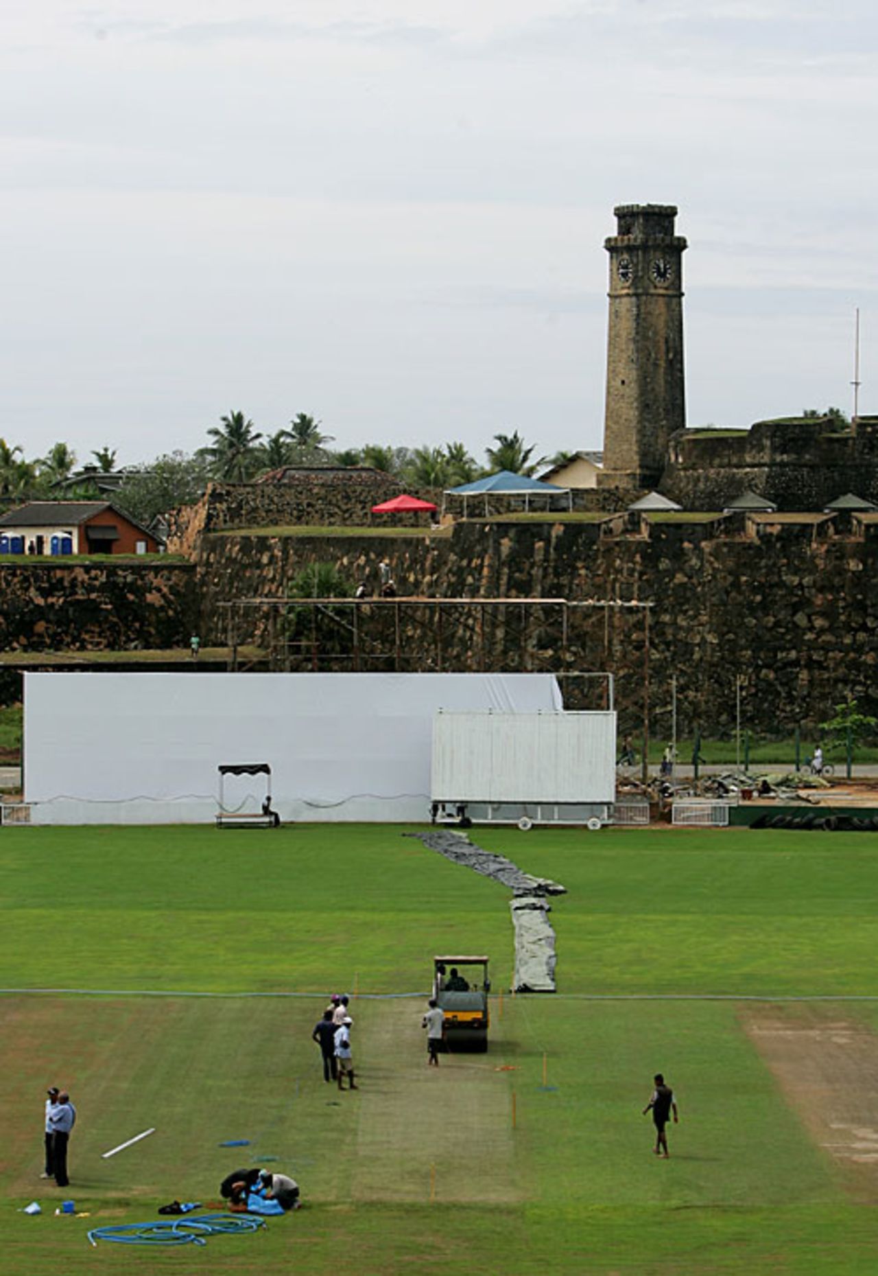 Groundsmen prepare the ground at the Galle Stadium ahead of the third Test, December 16, 2007