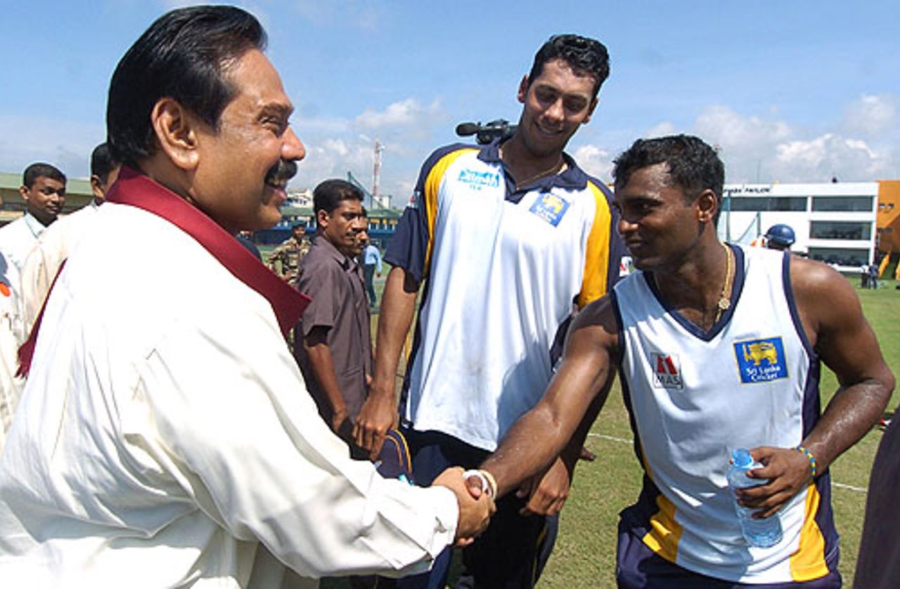 President Mahinda Rajapaksa greets Chamara Silva as Michael Vandort looks on, Galle, December 17, 2007