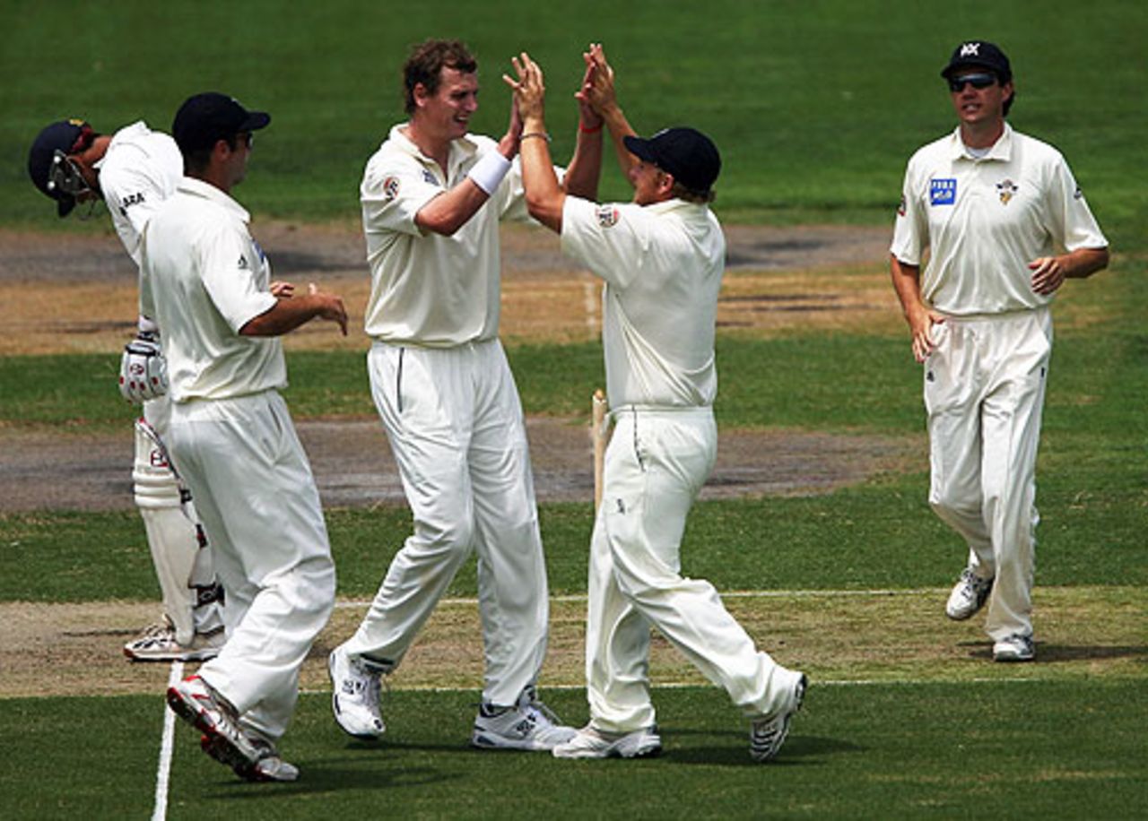 Allan Wise and his Victorian team-mates celebrate, Victoria v Indians, tour match, Melbourne, 1st day, December 20, 2007