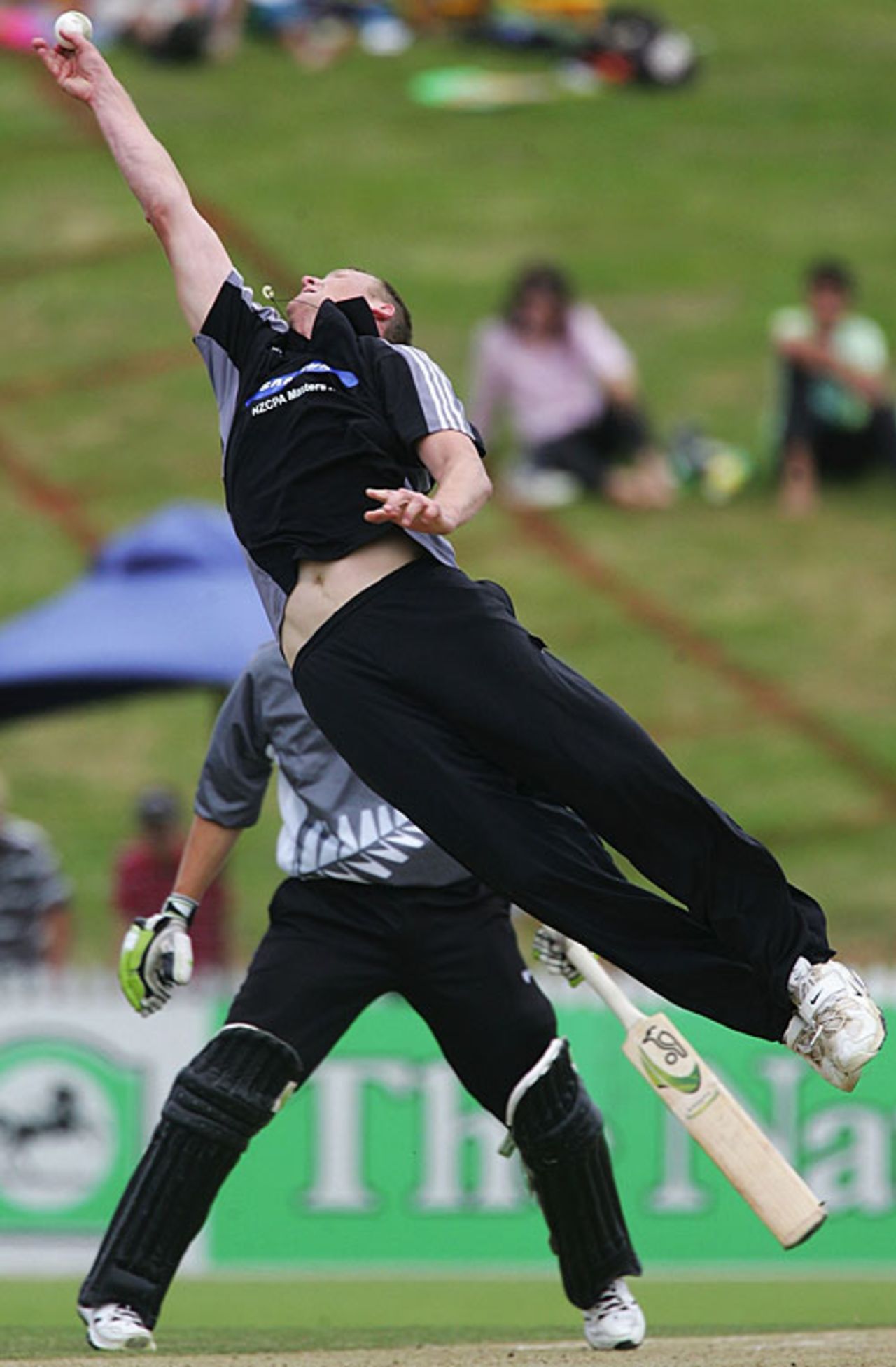Kerry Walmsley tries to take a catch off his bowling, NZCPA Masters XI v New Zealand Under-19, Twenty20 match, Seddon Park, Hamilton, December 23, 2007