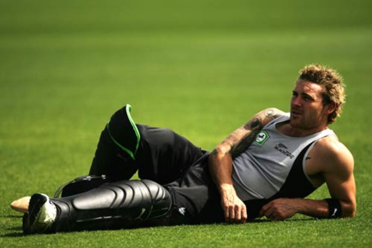 Brendon McCullum relaxes on the turf during a training session, Auckland, December 25, 2007