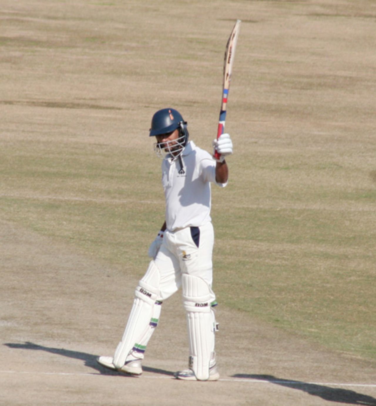 Hemant Dogra raises his bat after reaching his half-century, Himachal Pradesh v Rajashtan, Ranji Tropy Super League, Group A, 7th round, 1st day, Dharamsala, December 25, 2007 
