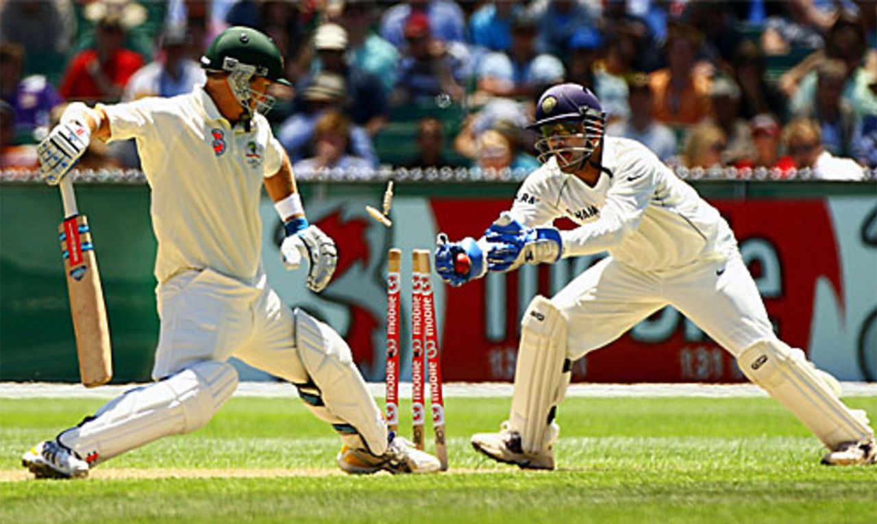 Gotcha! Mahendra Singh Dhoni is too quick for Phil Jaques, Australia v India, 1st Test, MCG, December 26, 2007 